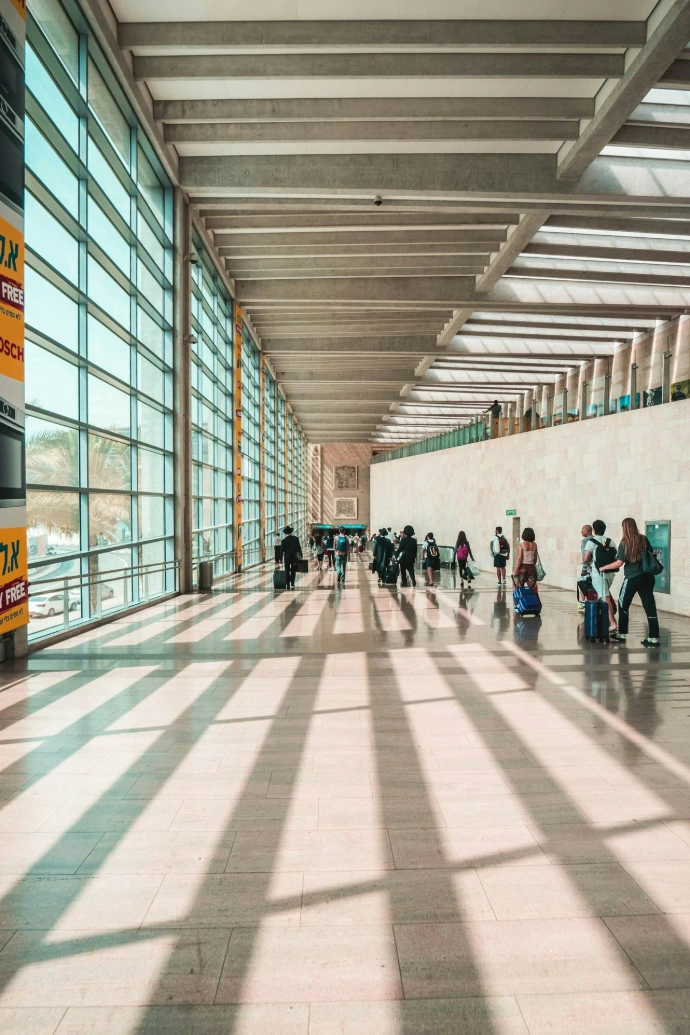 people walking on hallway during daytime